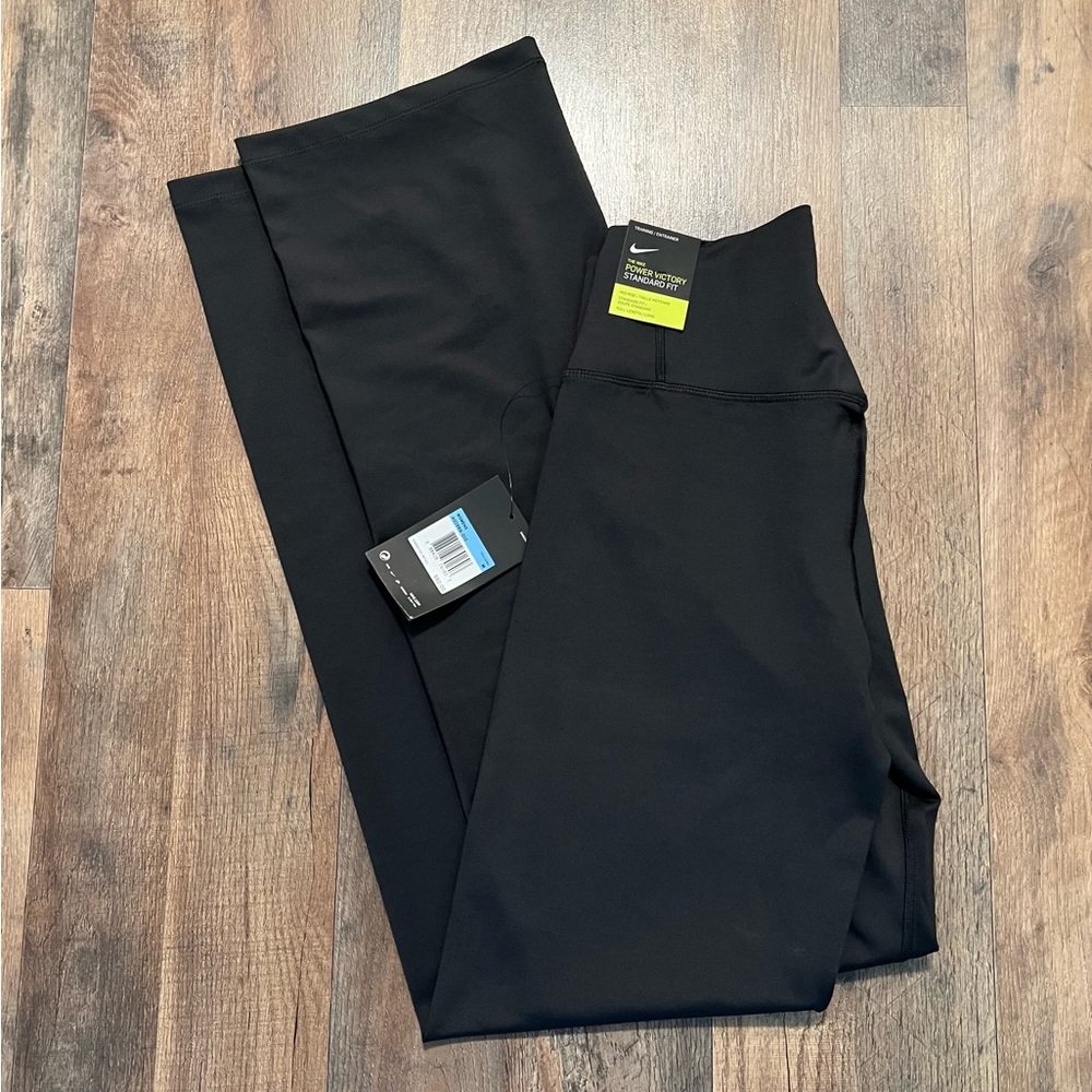 New with tags  Nike power victory standard fit women’s pant size medium